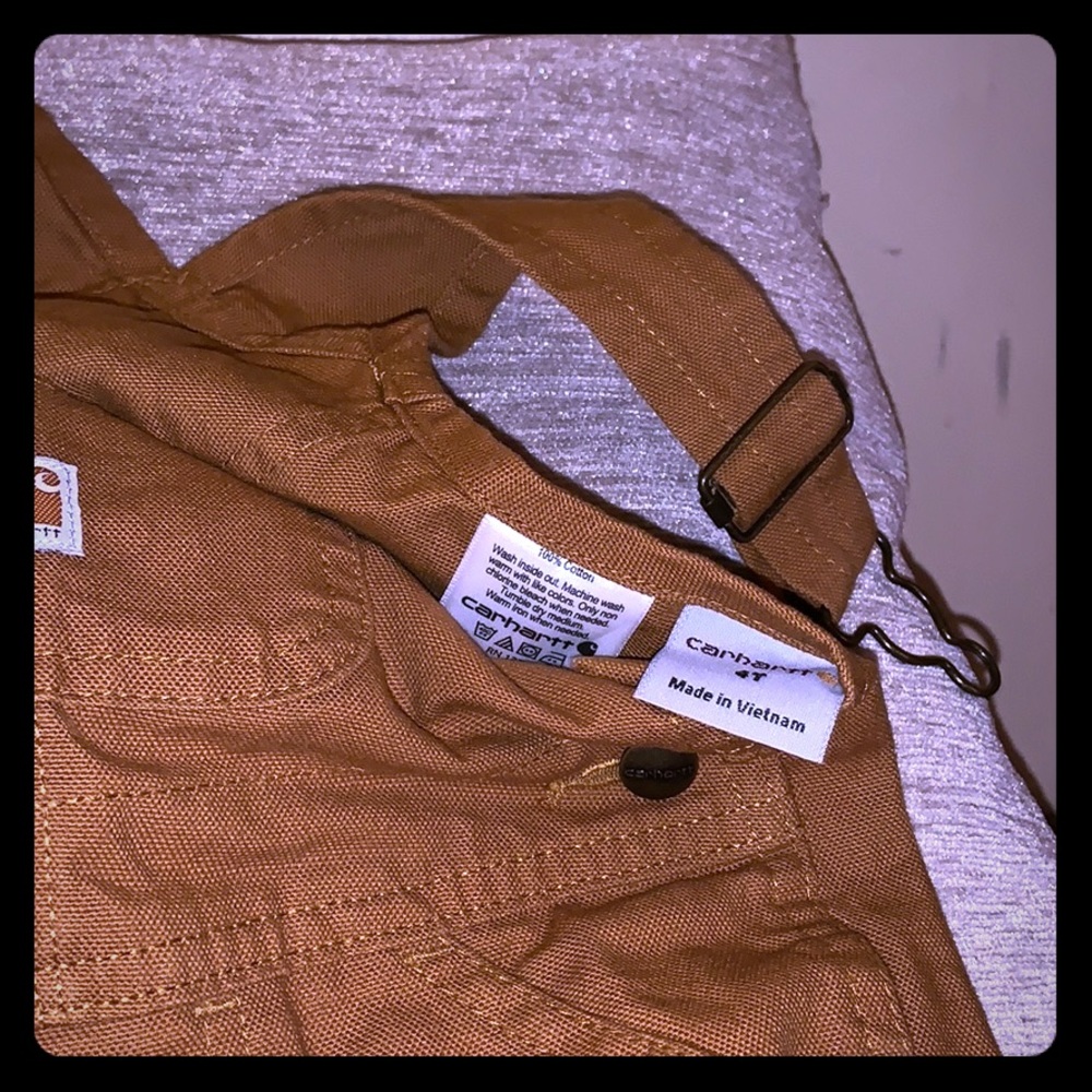 Little boy brown overhauls